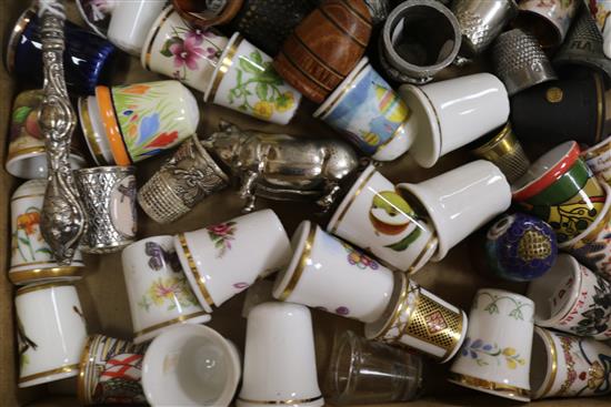 Five thimble display domes and a collection of ceramic, treen and other thimbles,